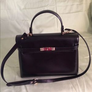 Black leather I Santi purse